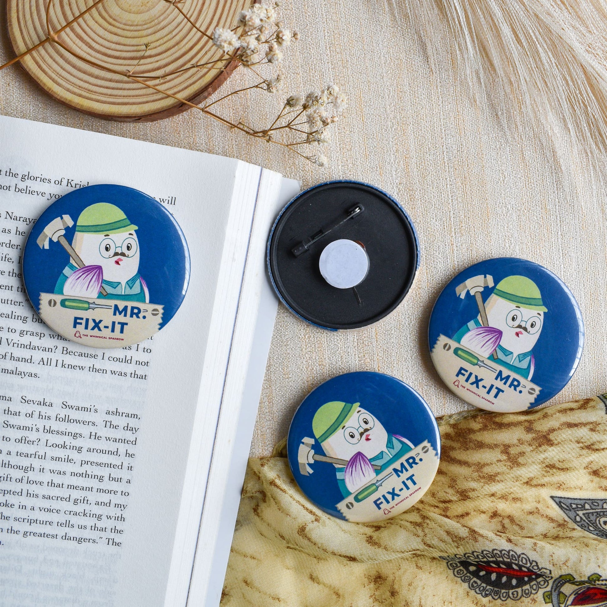 Blue Fix it pin badge for dad with cute bird design on book