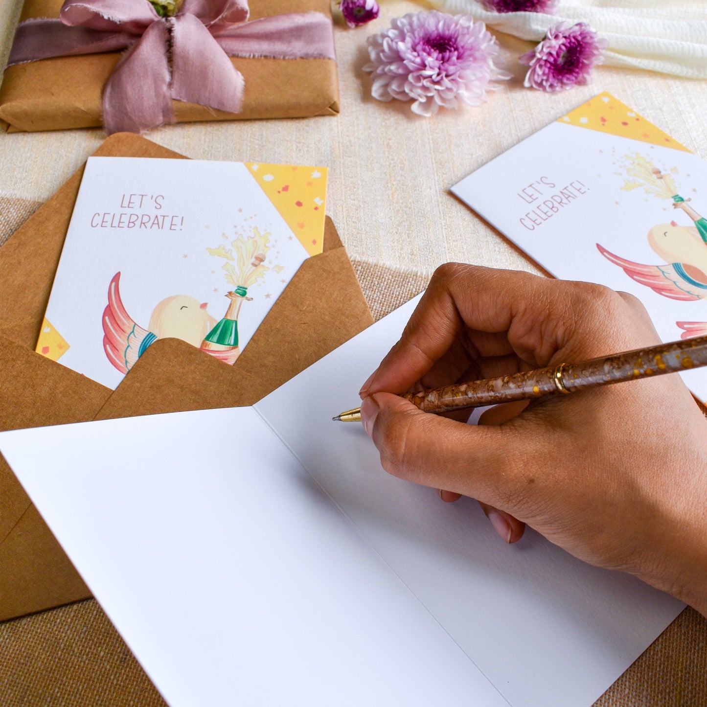 Writing message inside funny celebration greeting card