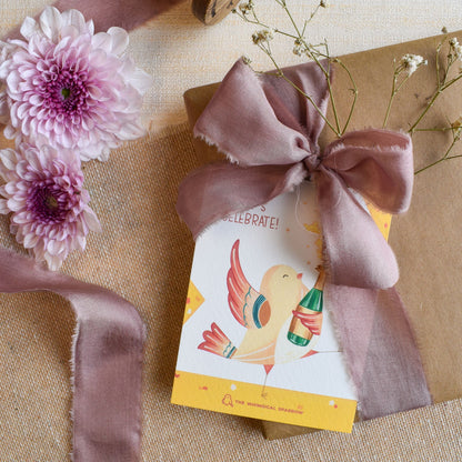 Dancing bird with champagne design celebration gift tag