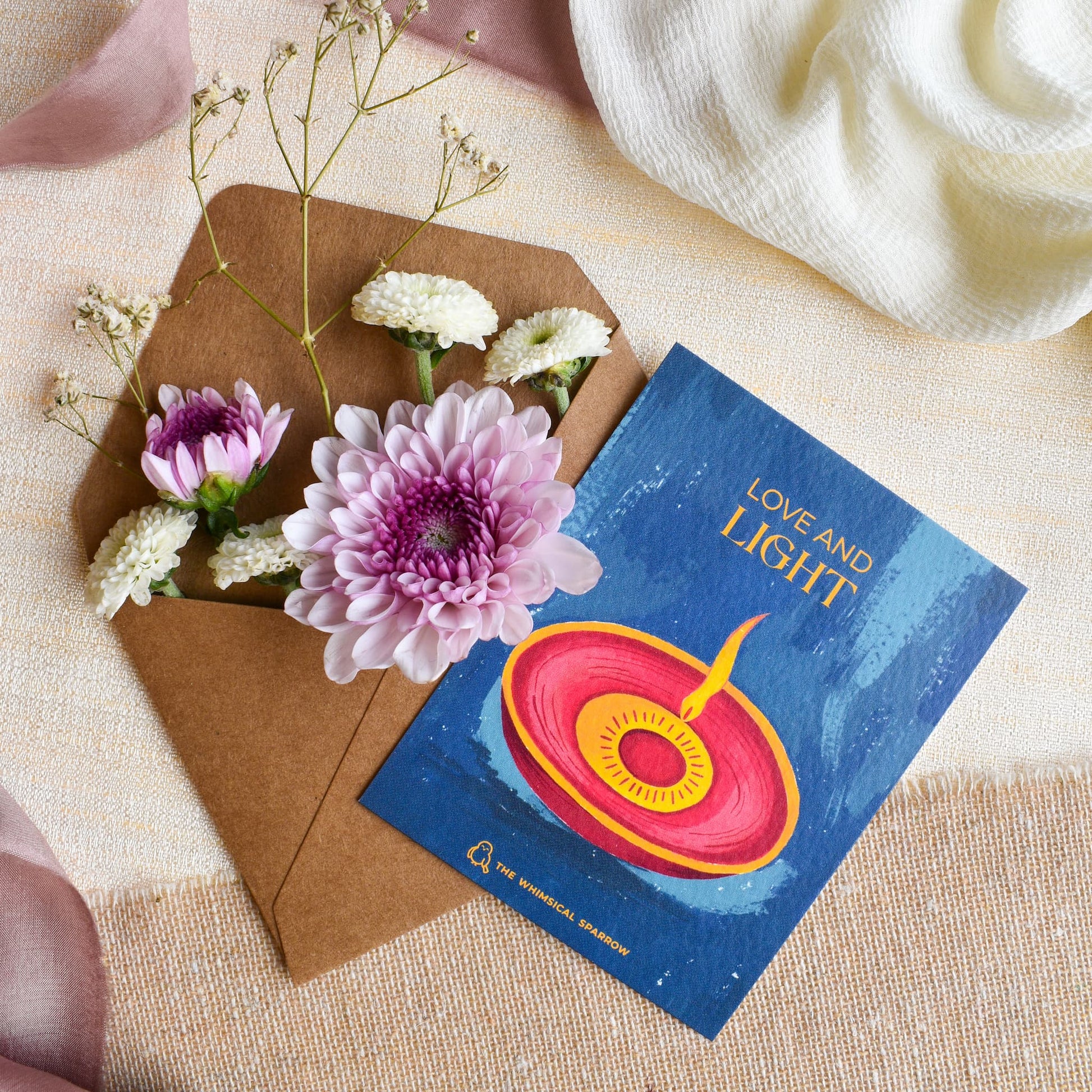 Beautiful blue diya design on personalized note card with kraft paper envelope