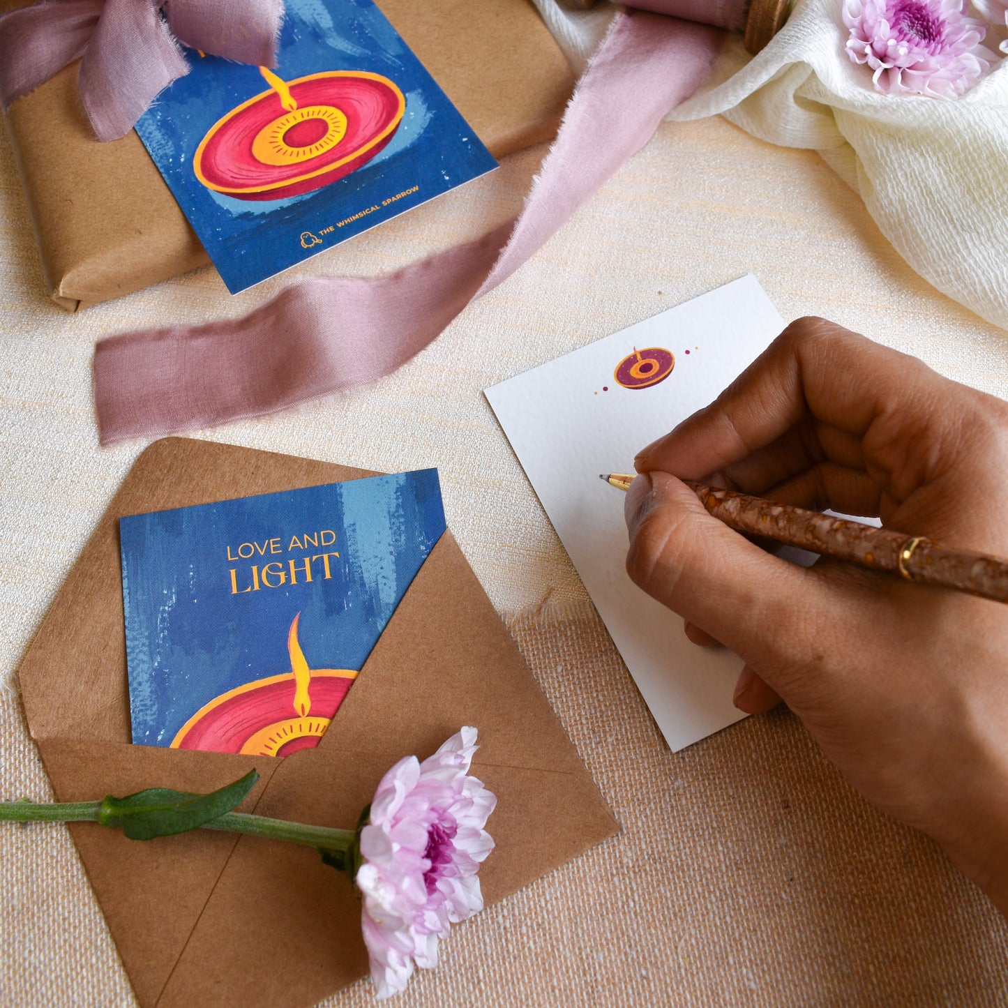Writing message on diwali hand painted note cards for gifting